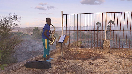 FIDEL WITH THE SAXOPHONE ON THE GARBAGE DUMP